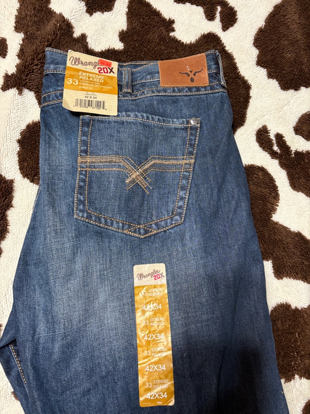 Wrangler Men’s Blue Relaxed Fit Jeans with Leather Patch